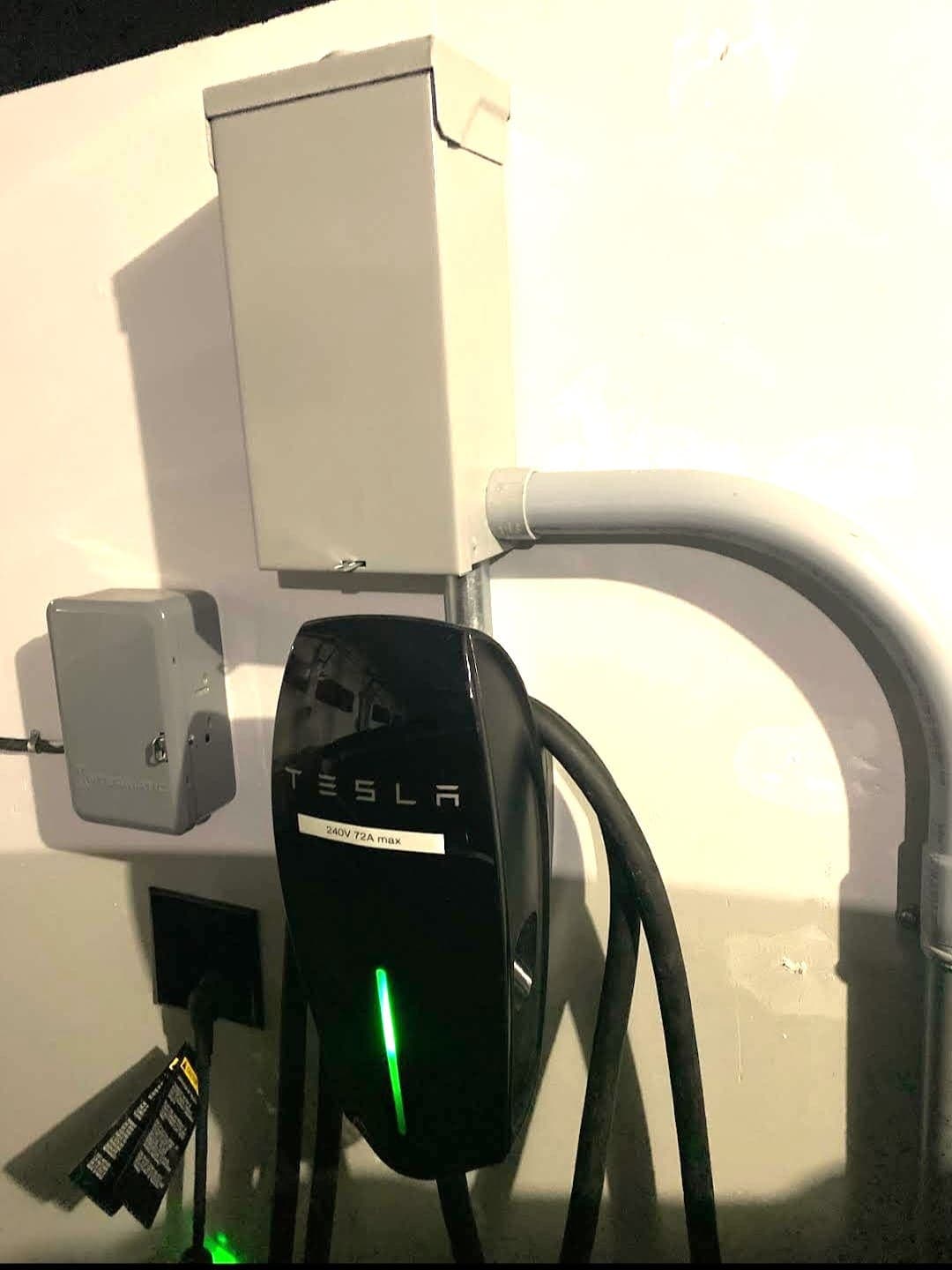 Tesla wall connector installed with a dedicated disconnect and conduit
