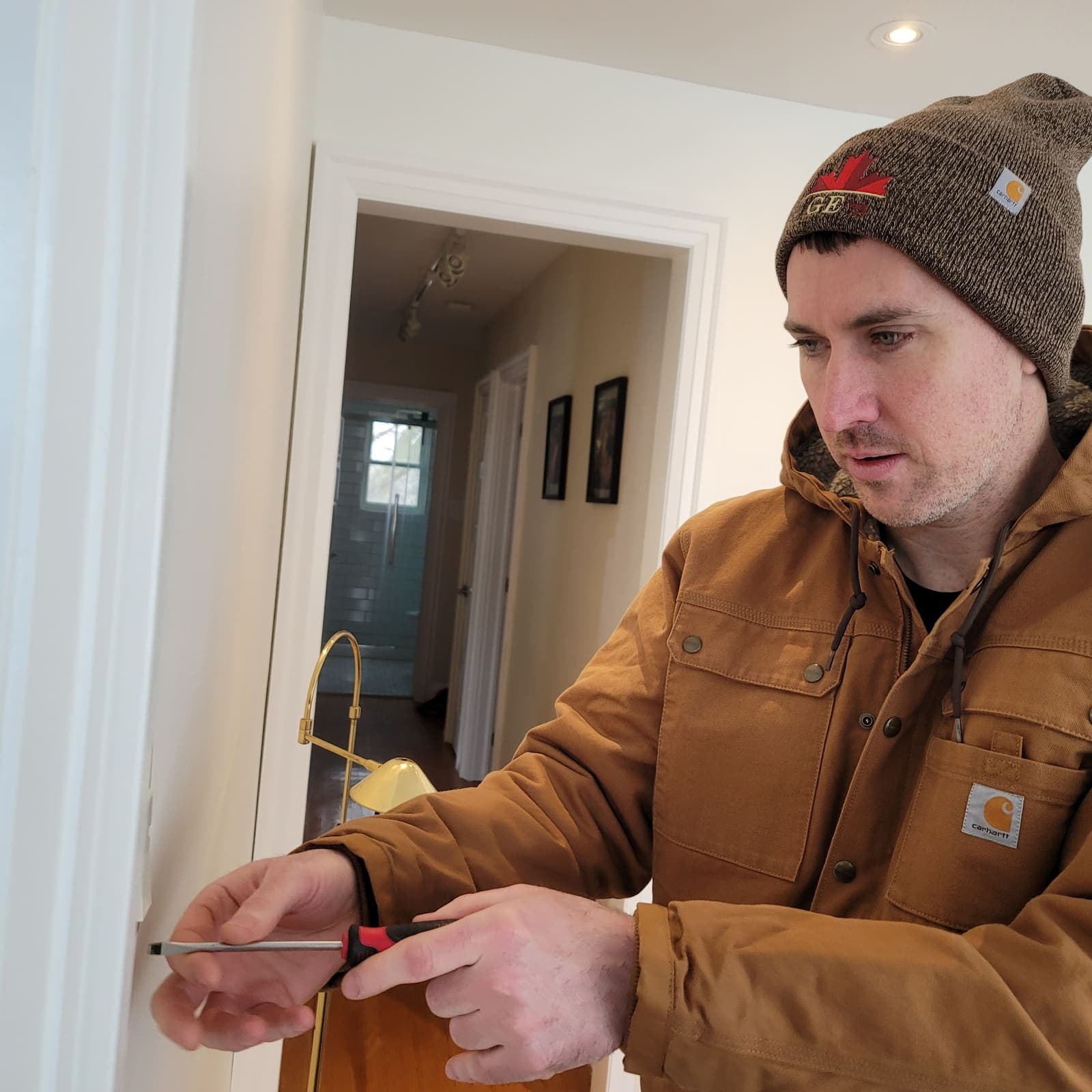 Georgetown Electric electrician installing a device in a Halton Hills home